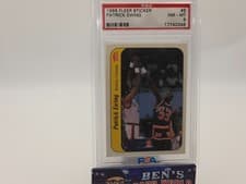 1986-87 Fleer Stickers #6 Patrick Ewing (RC) - PSA 8